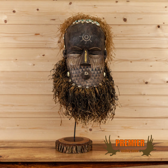 African tribal mask on stand for sale